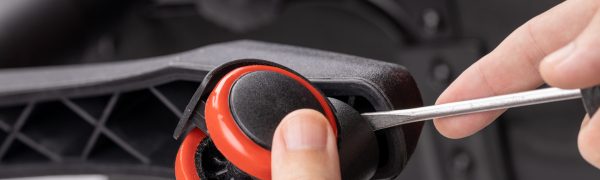 adjusting or repair office armchair. worker fixing arm chair. close up. diy concept.